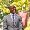 Dr. Jason Wingard, president of Temple University, smiling while outside on Main Campus